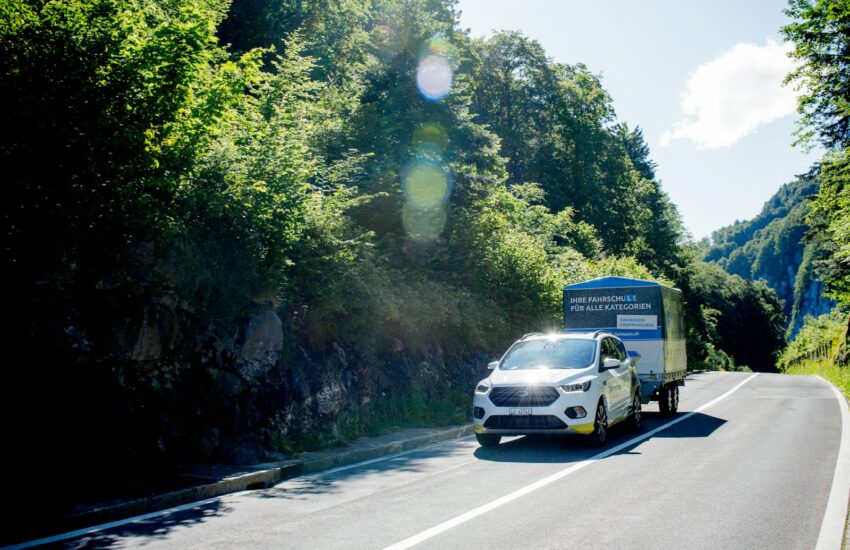 white car on road during daytime